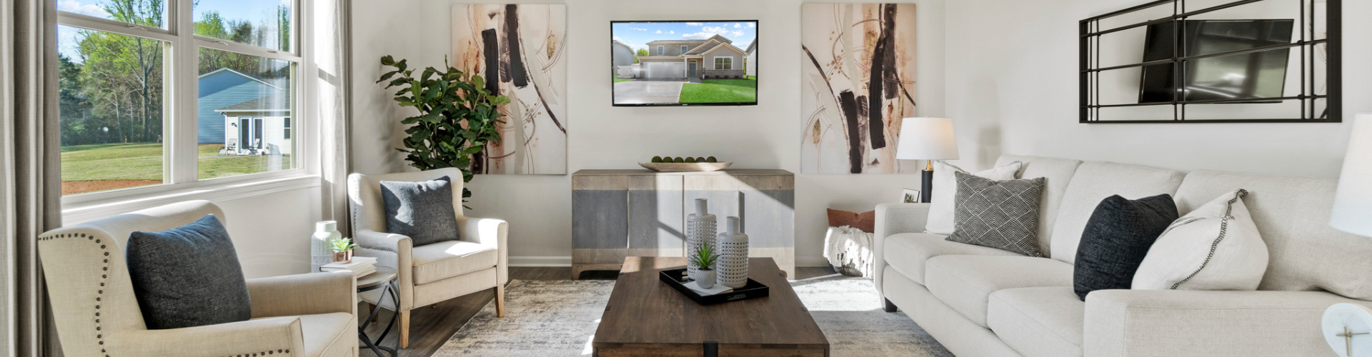 A living room with a large window.