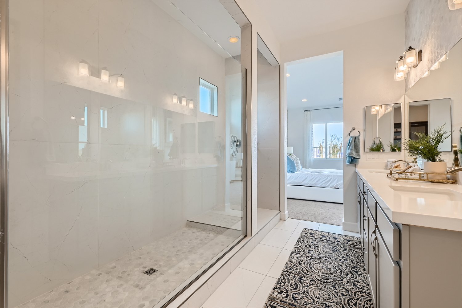 A bathroom with a glass shower.