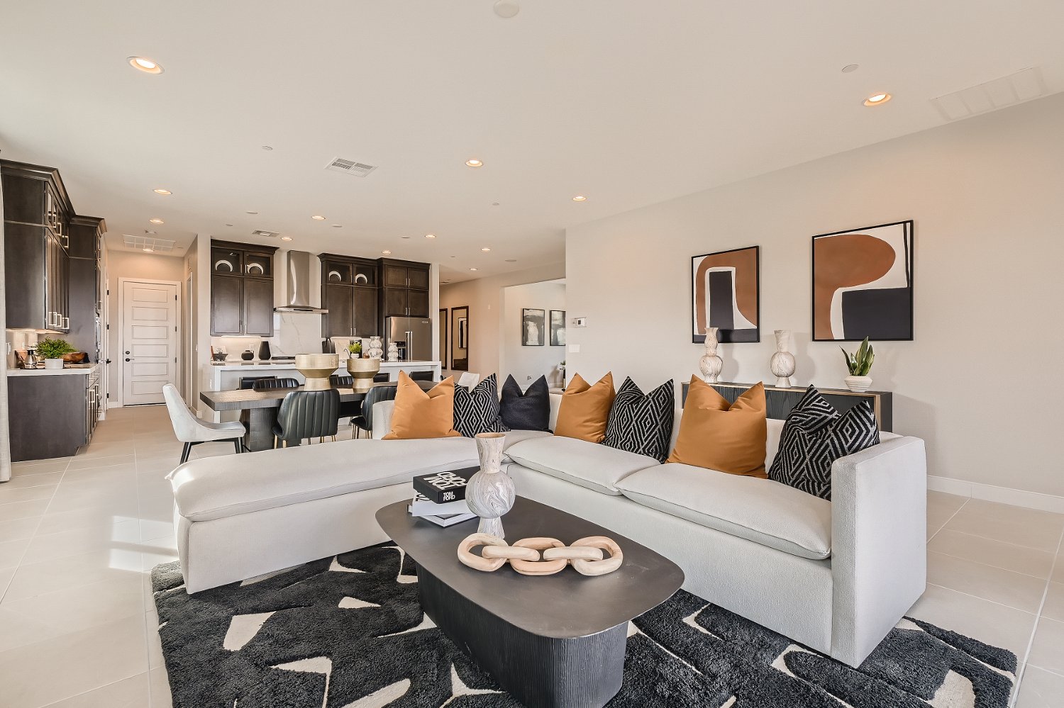 A living room with a couch and a table.