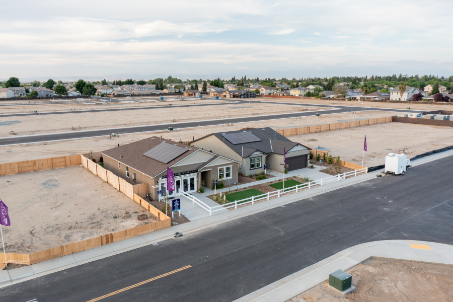 A road with a building along it.