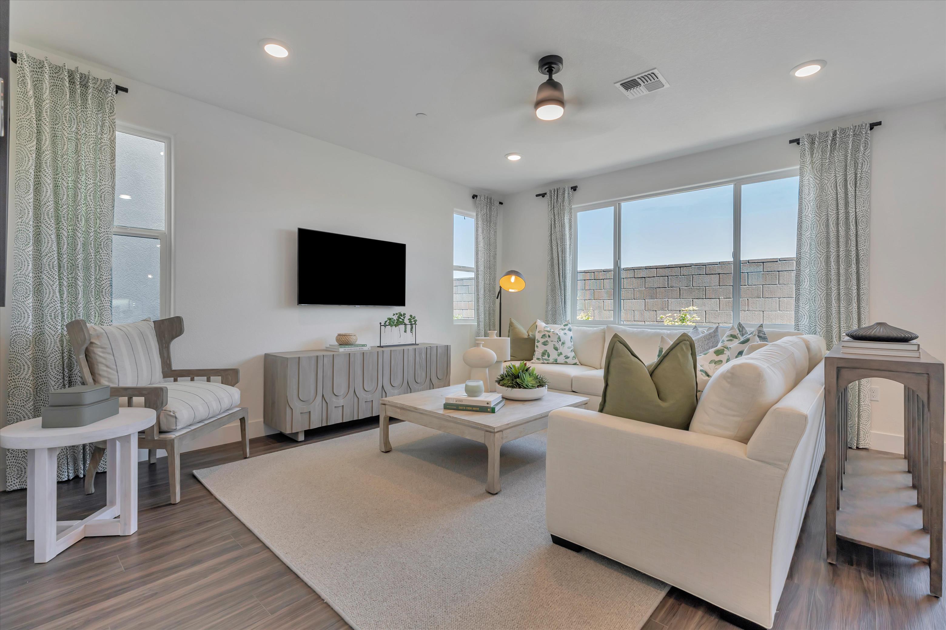 A living room with a large window.