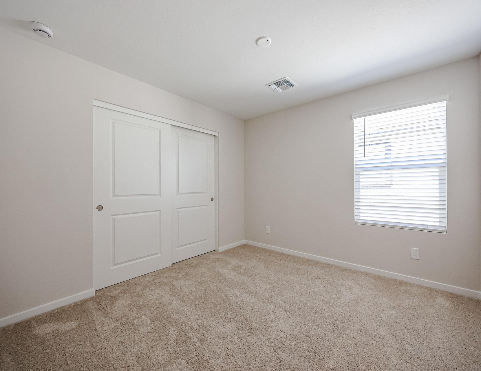 A room with white doors.