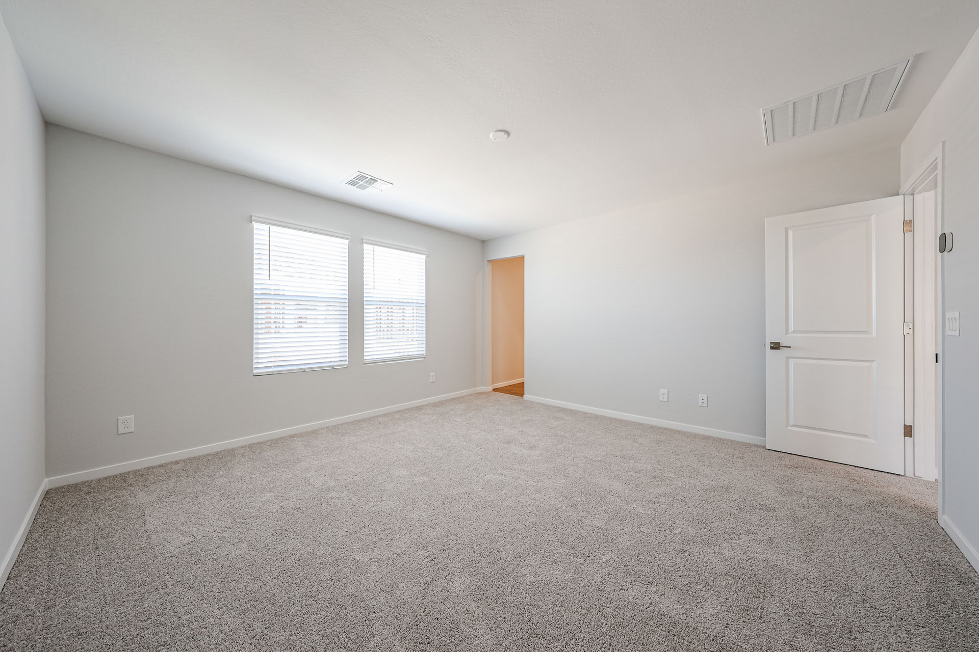 A room with white doors.