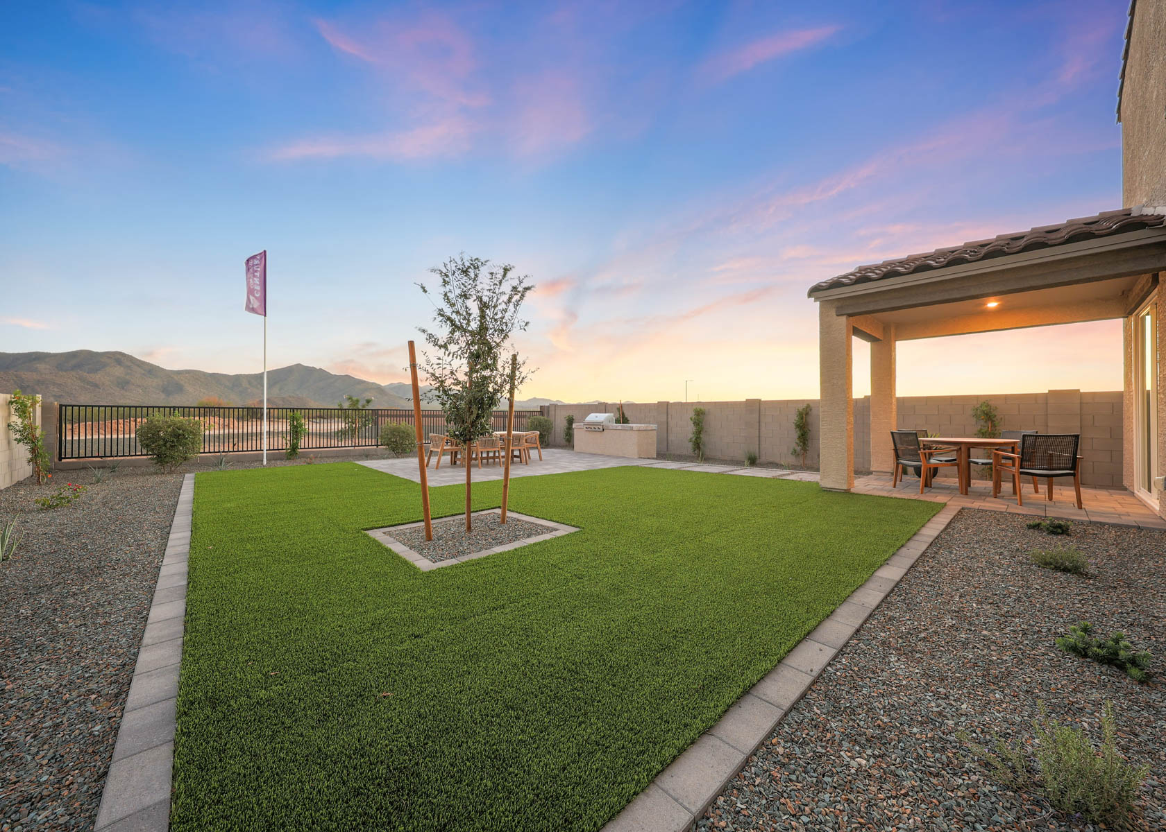 A building with a grass yard.