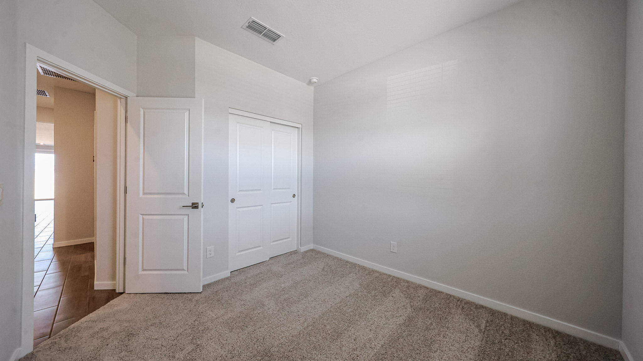 A room with white doors.