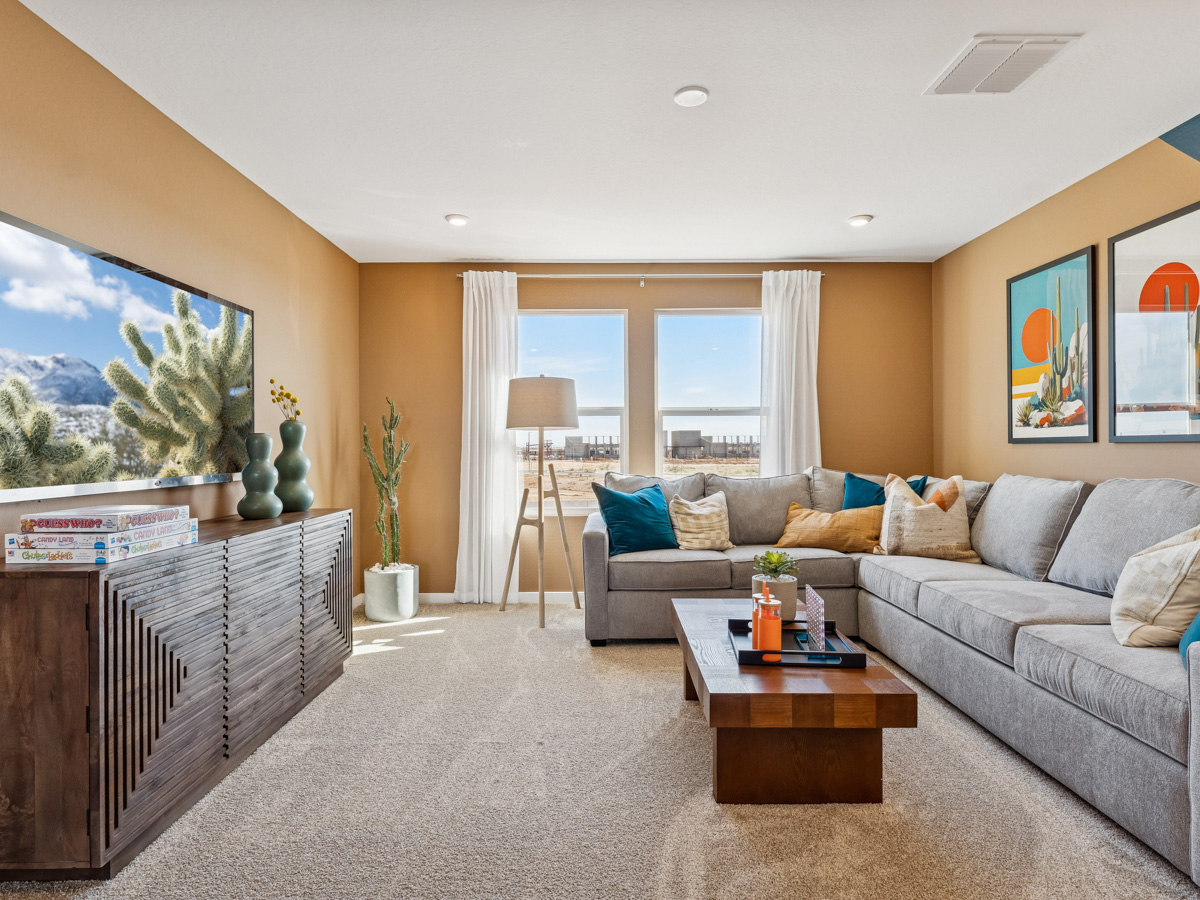 A living room with a couch and a coffee table.