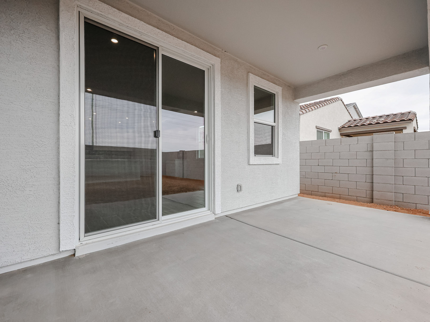 A room with a glass door.