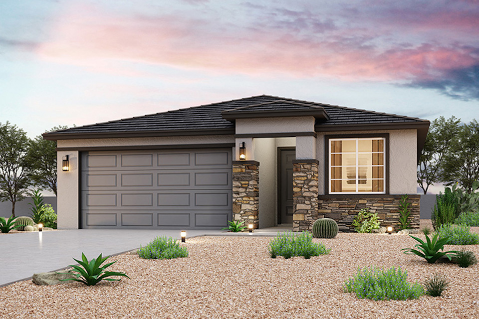 A house with a stone patio.