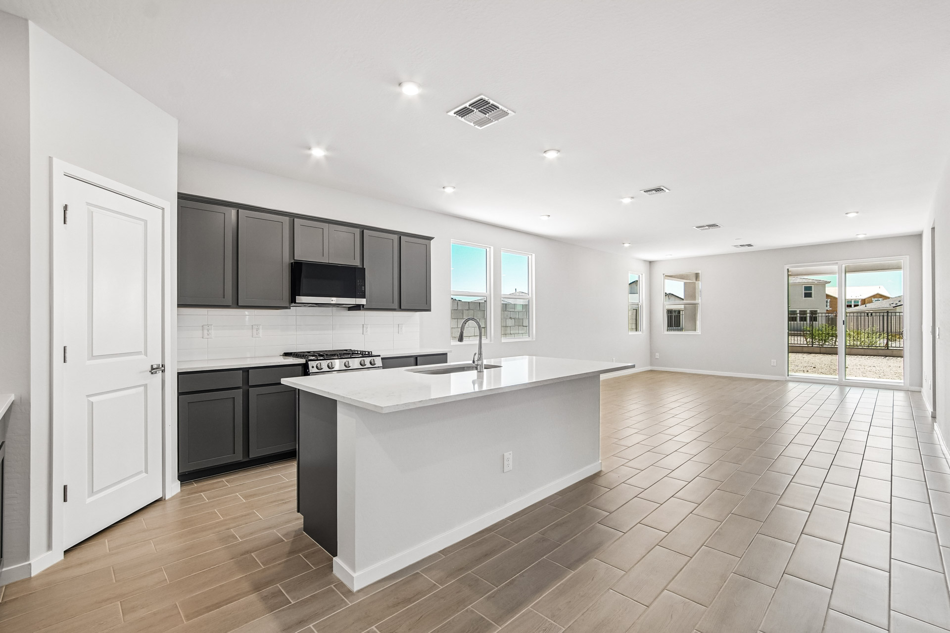 A kitchen with a large island.