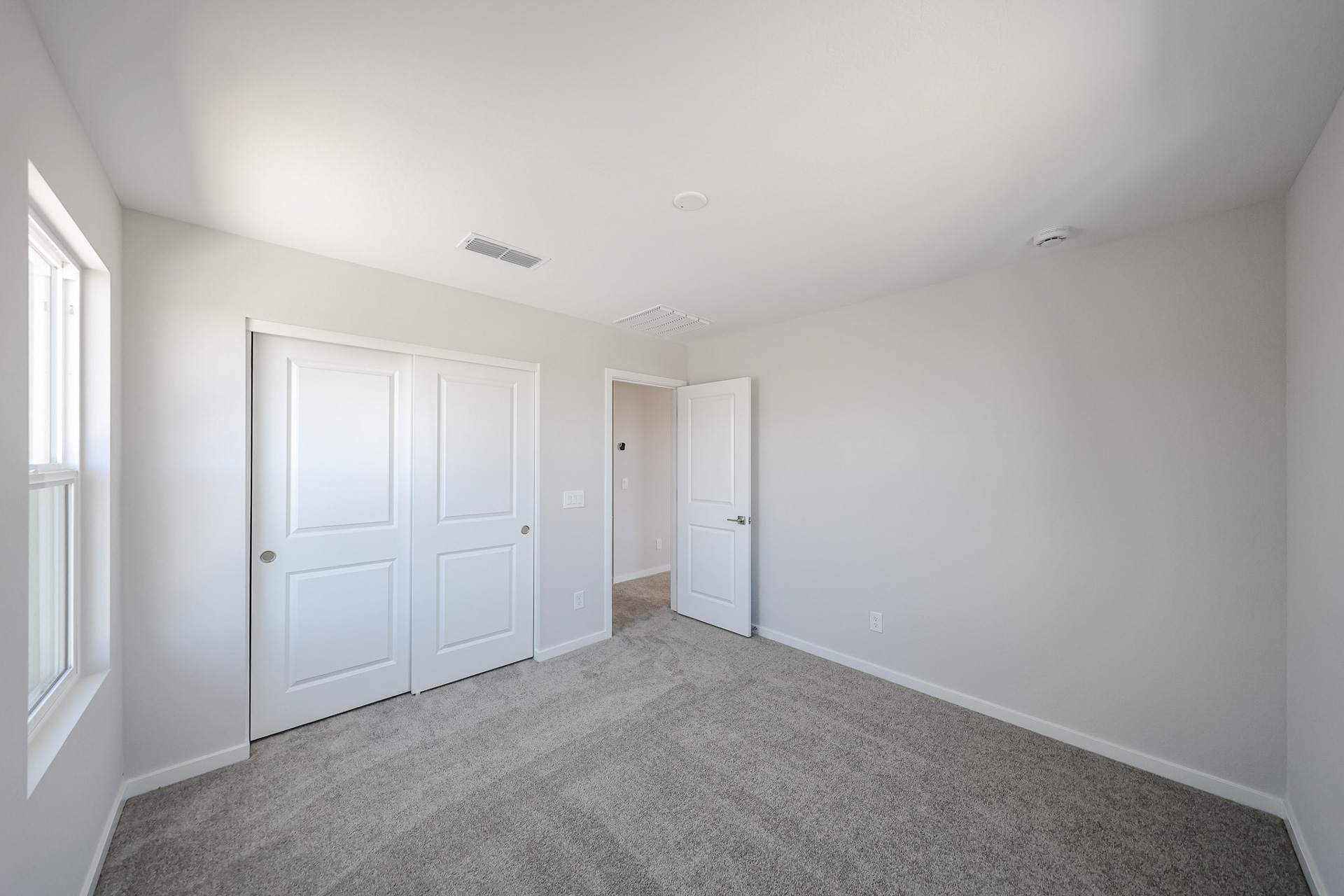 A room with white doors.