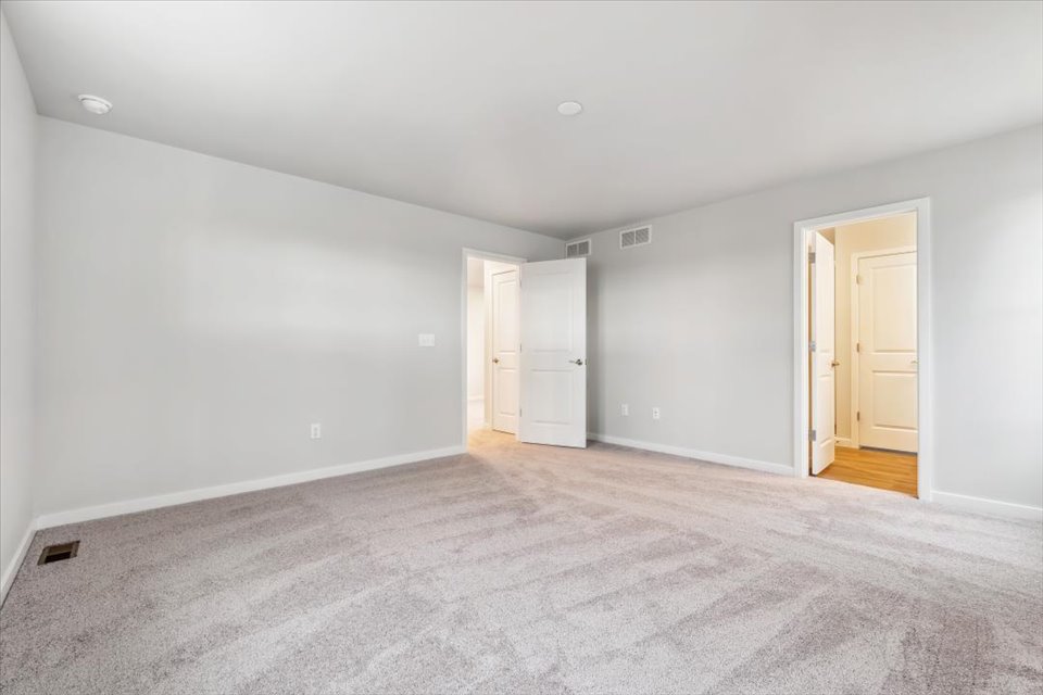 A room with white doors.