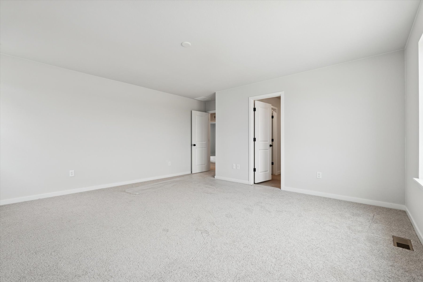 A room with white walls.