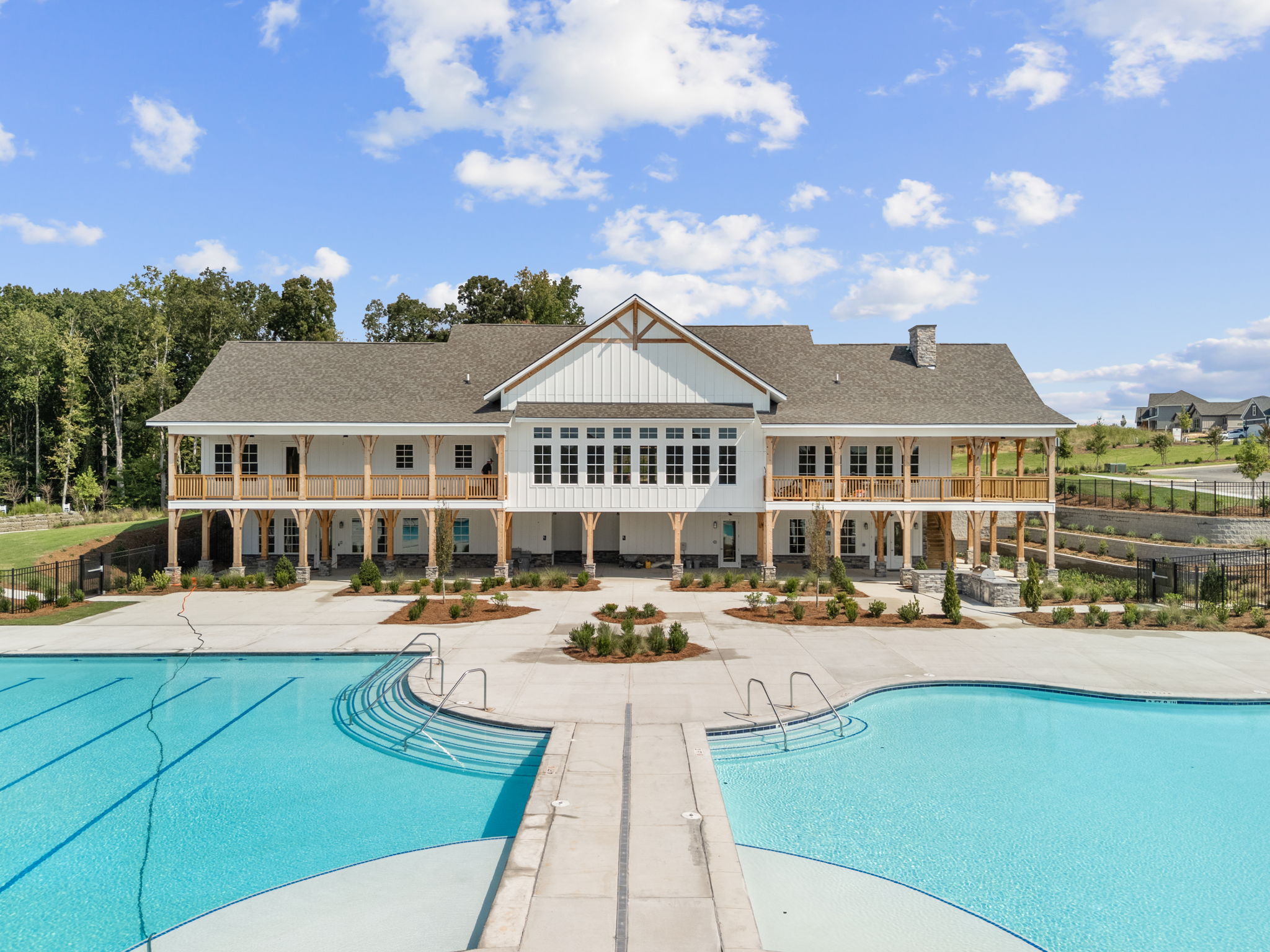 A large house with a pool.