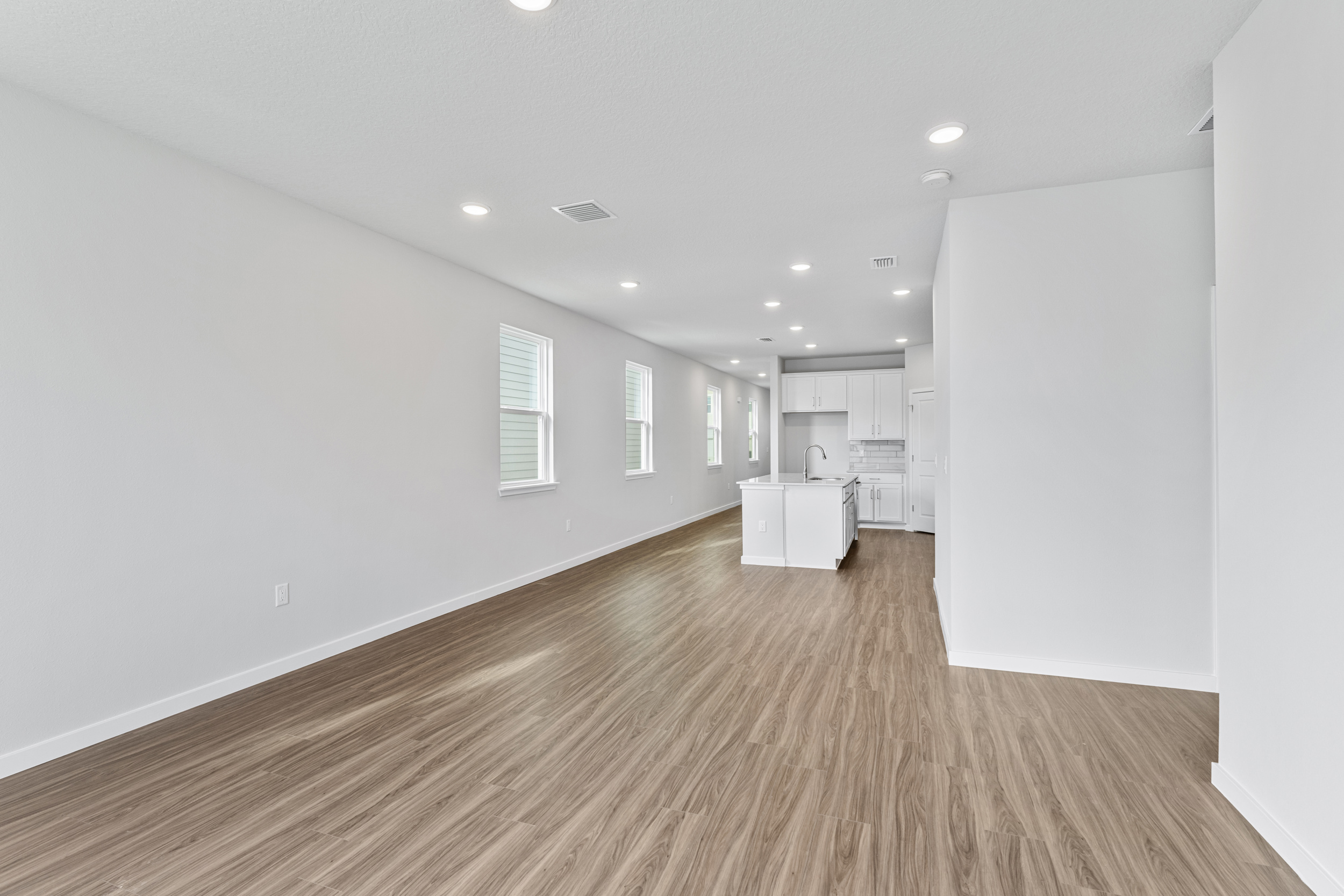 Lot 26 Great Room with Kitchen in Back at The Preserve at Camden Woods