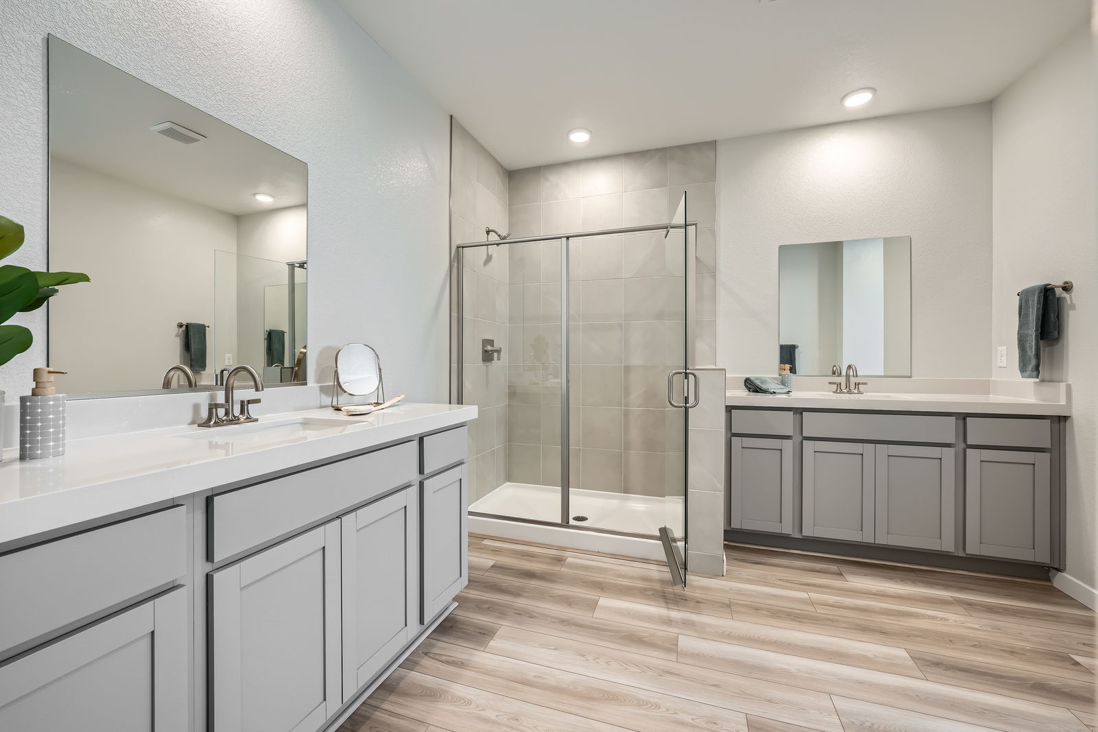 A bathroom with a glass shower.