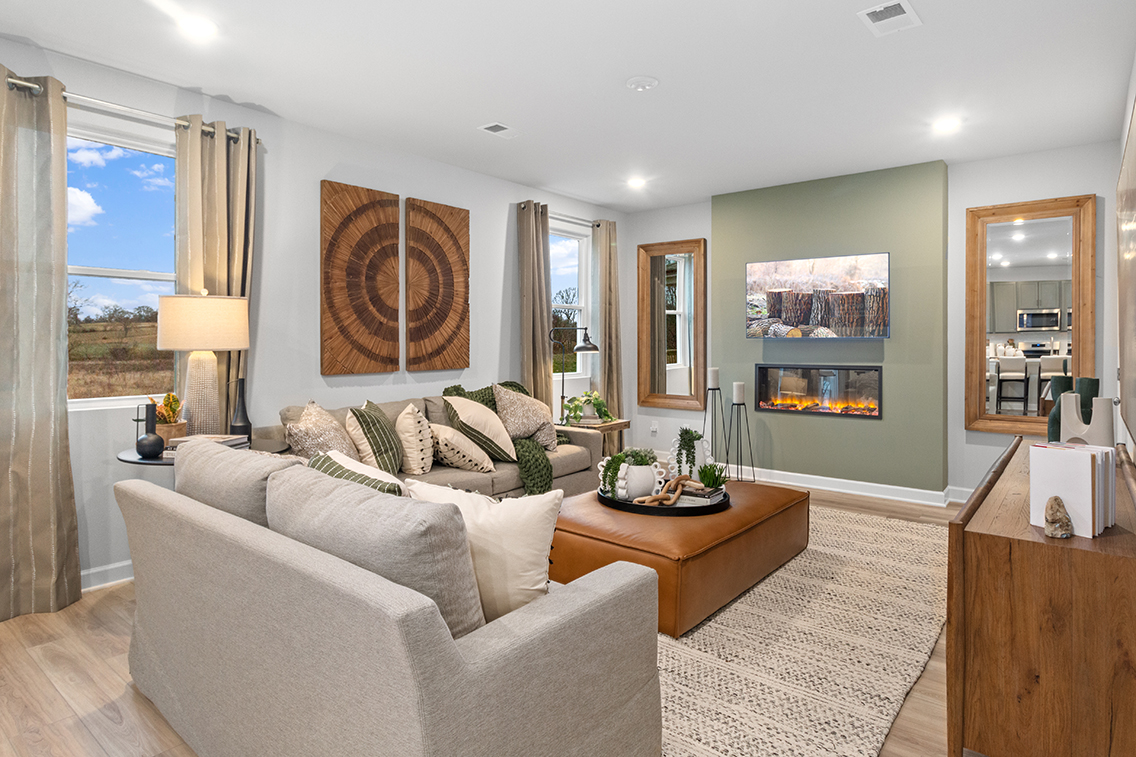 A living room with a large window.