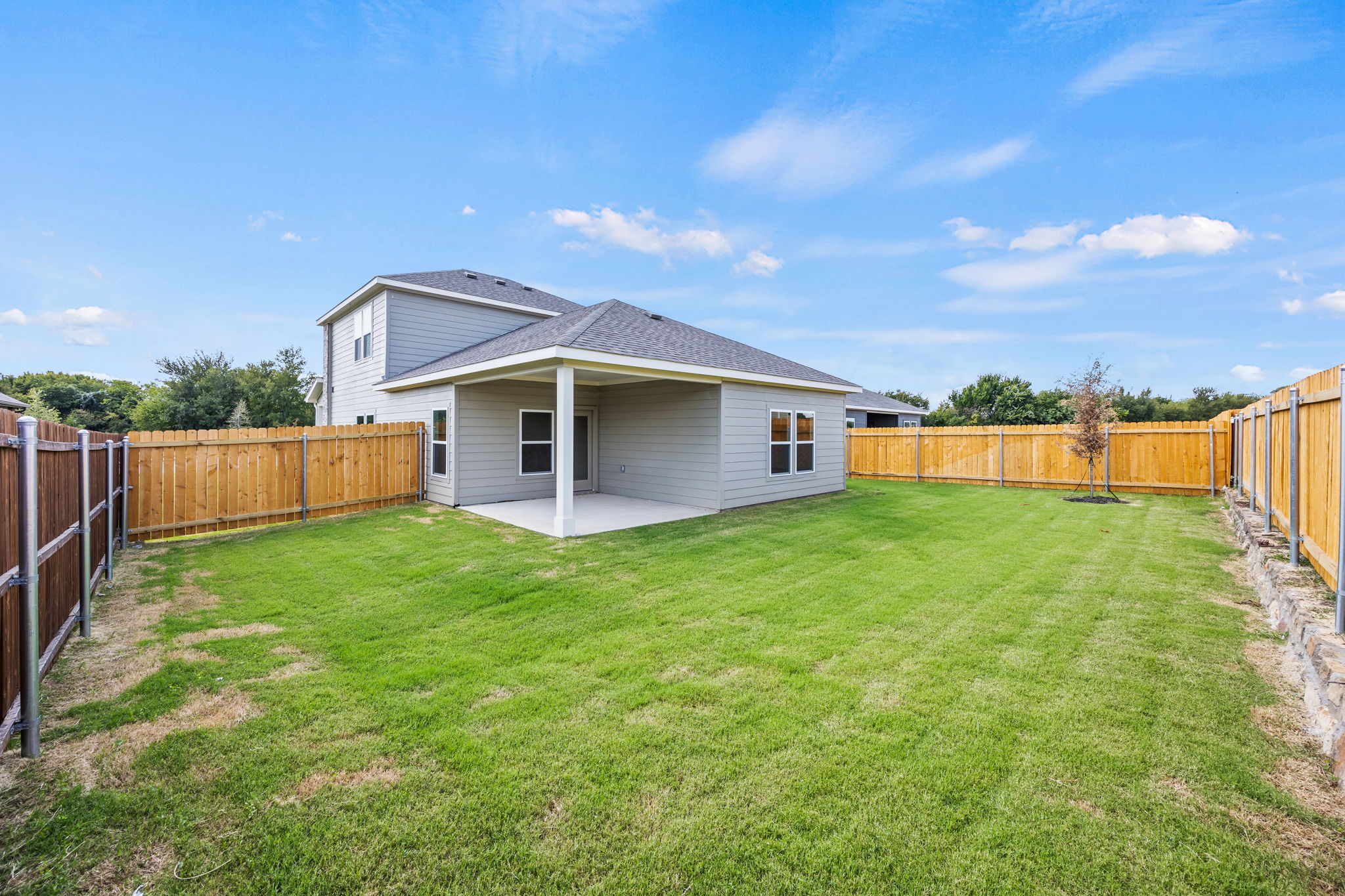 A house with a fence around it.