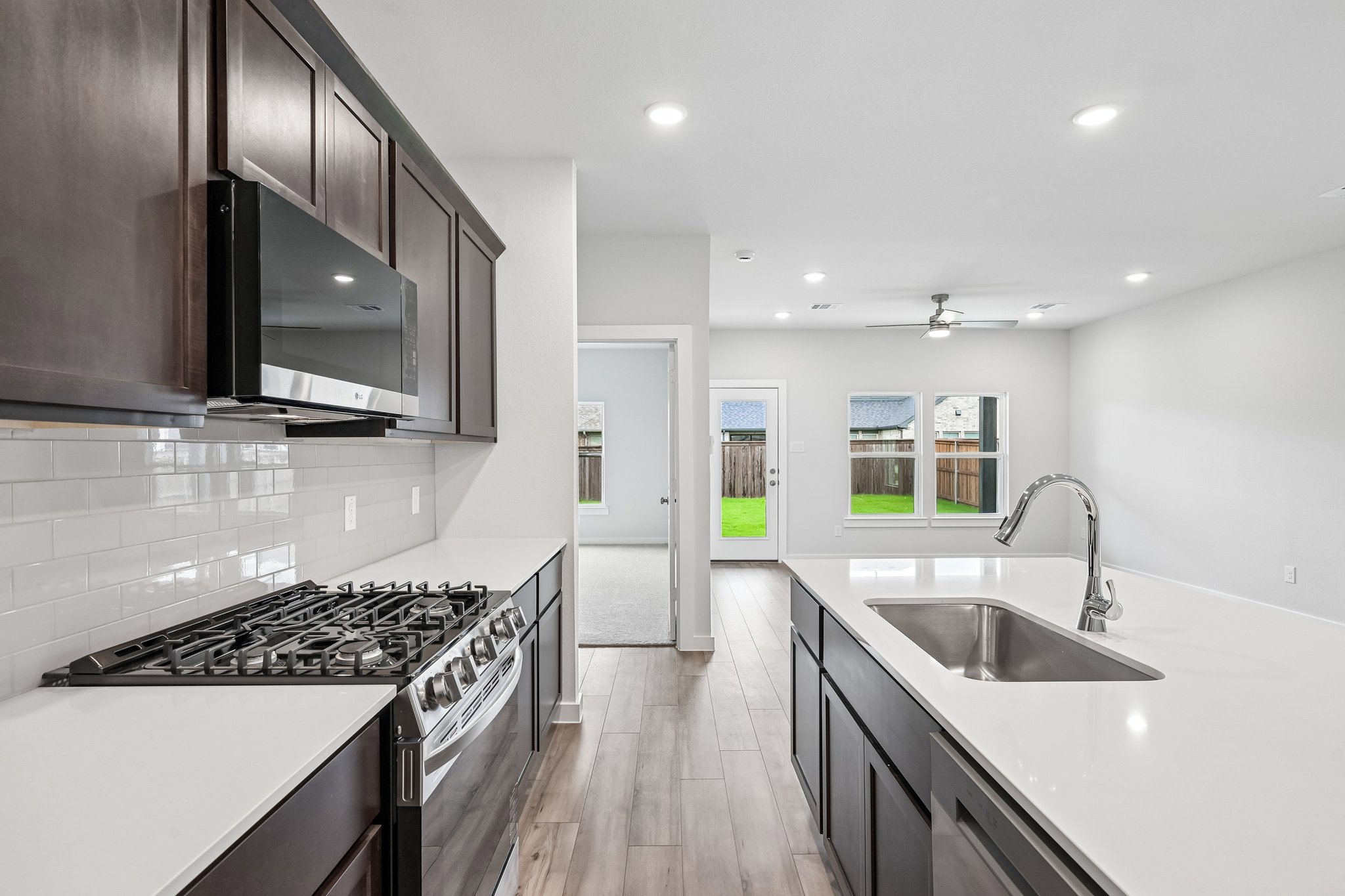 A kitchen with a stove and oven.