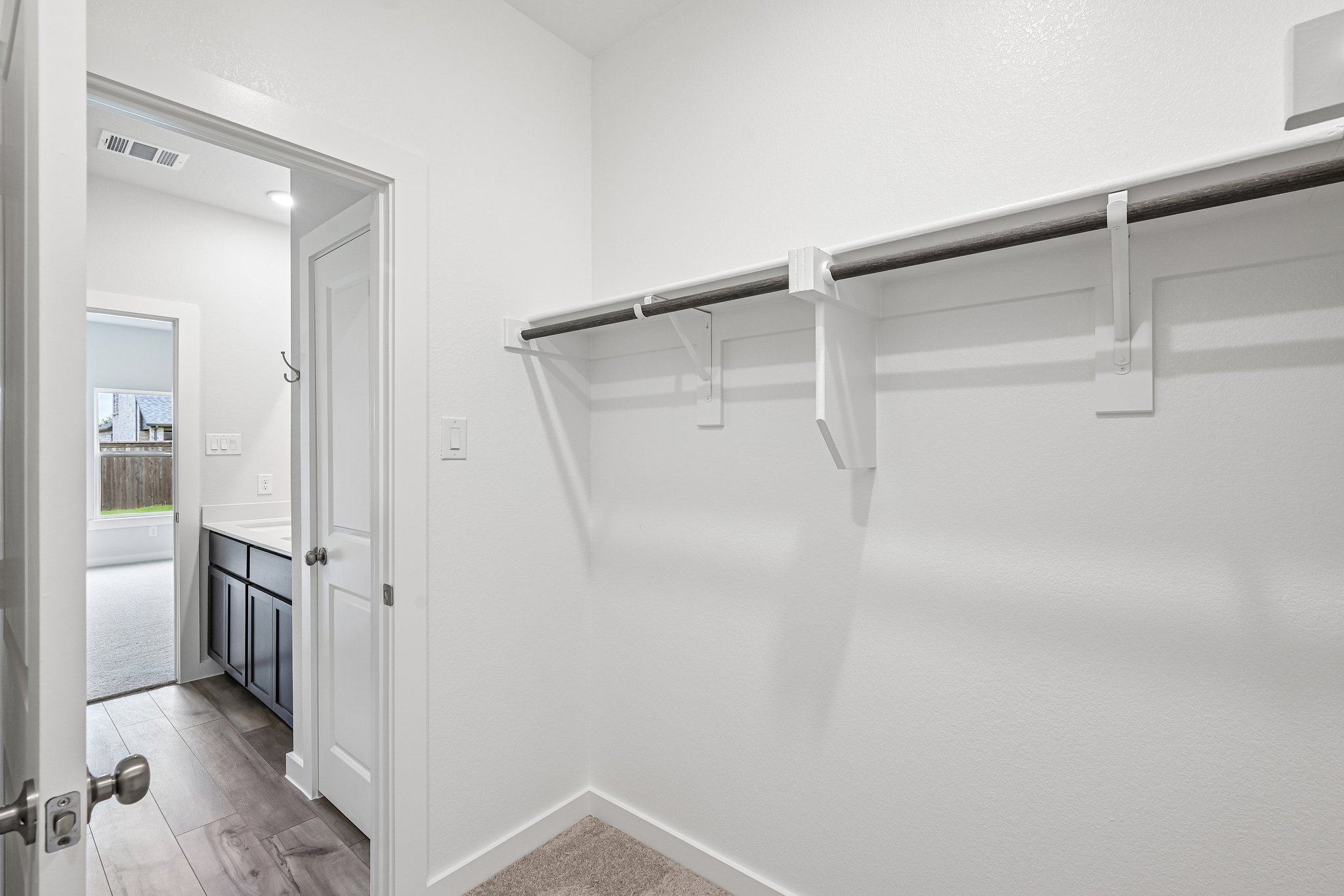 A white room with a white wall.