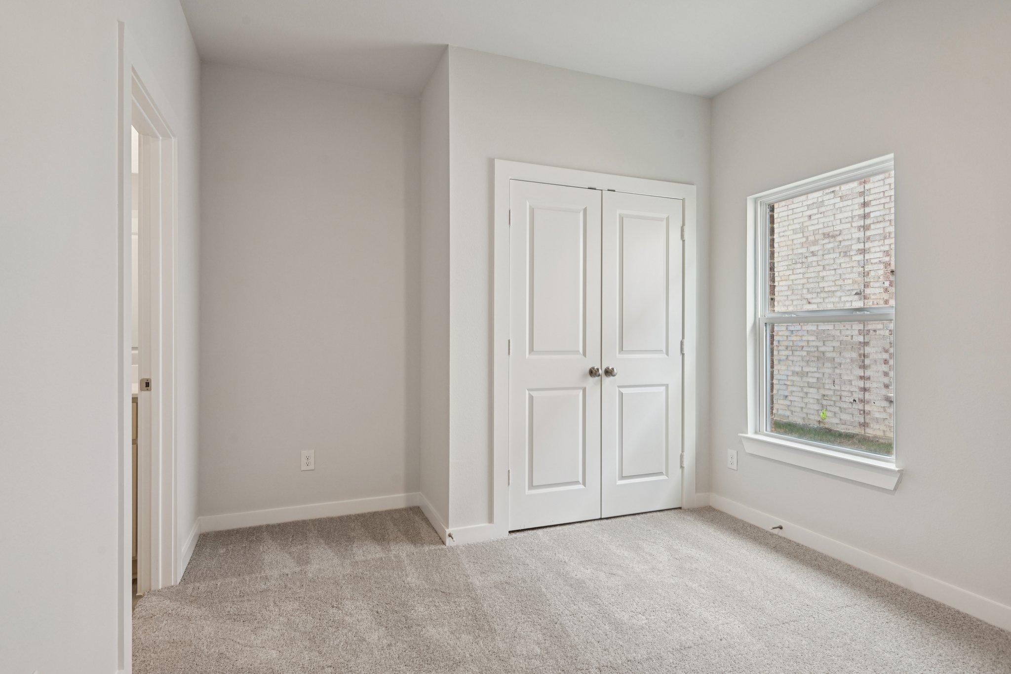 A room with white doors.