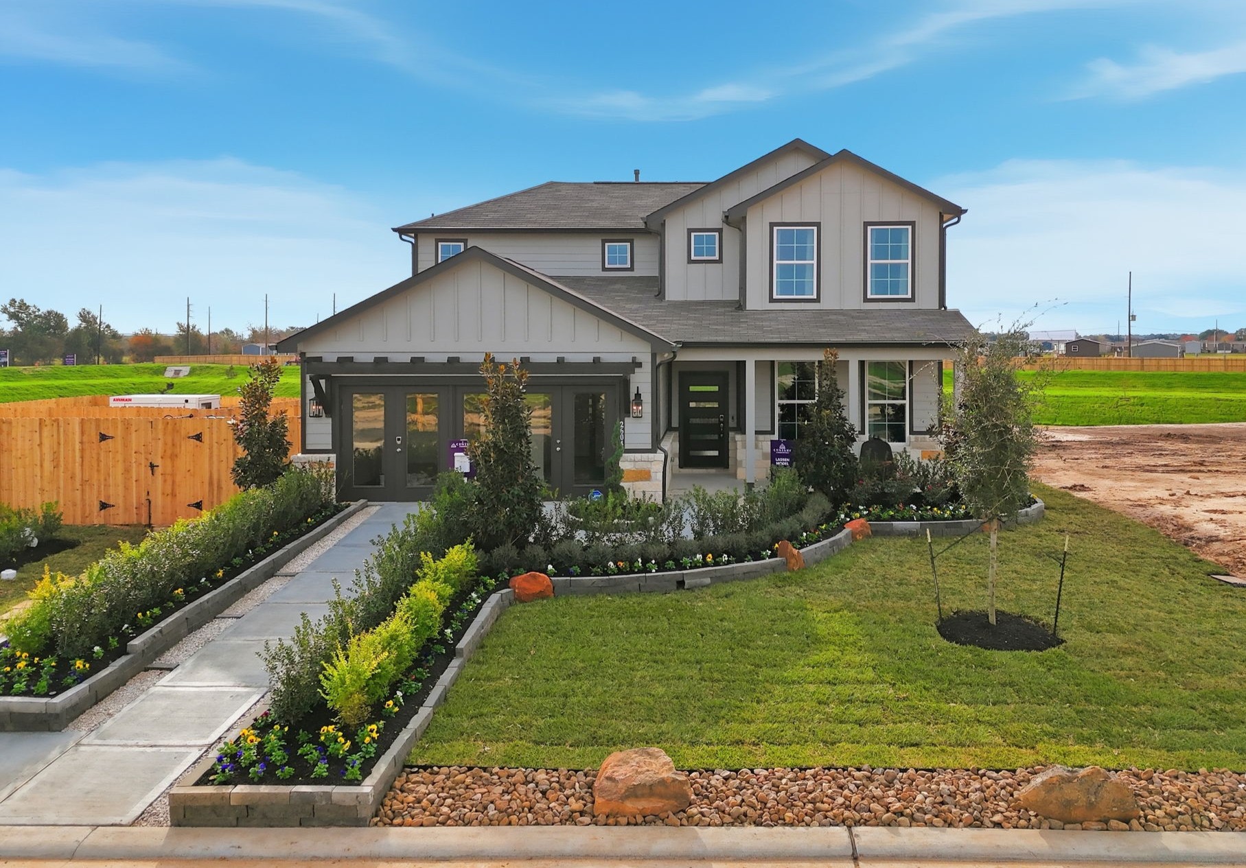 A house with a large front yard.