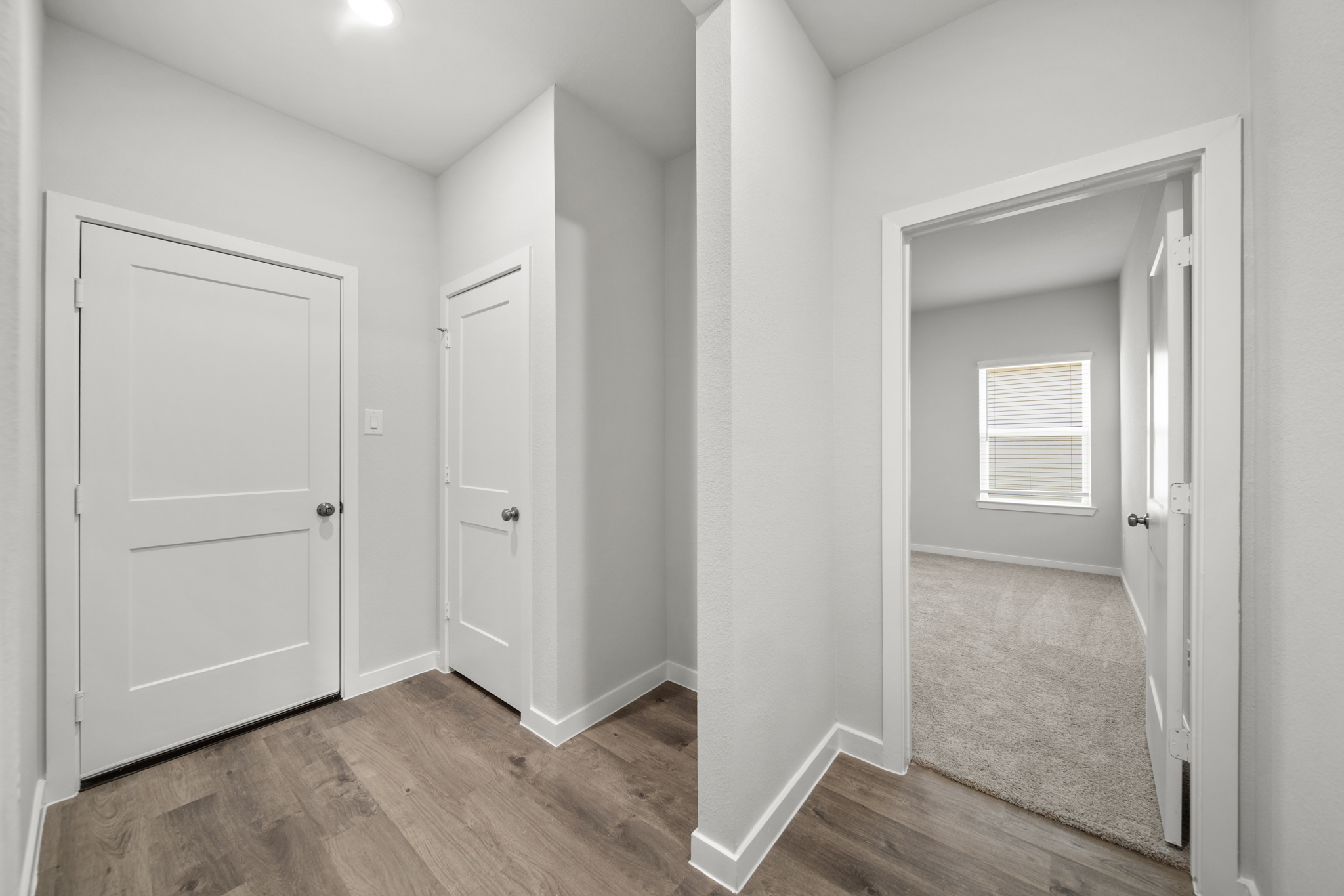 A room with white doors.