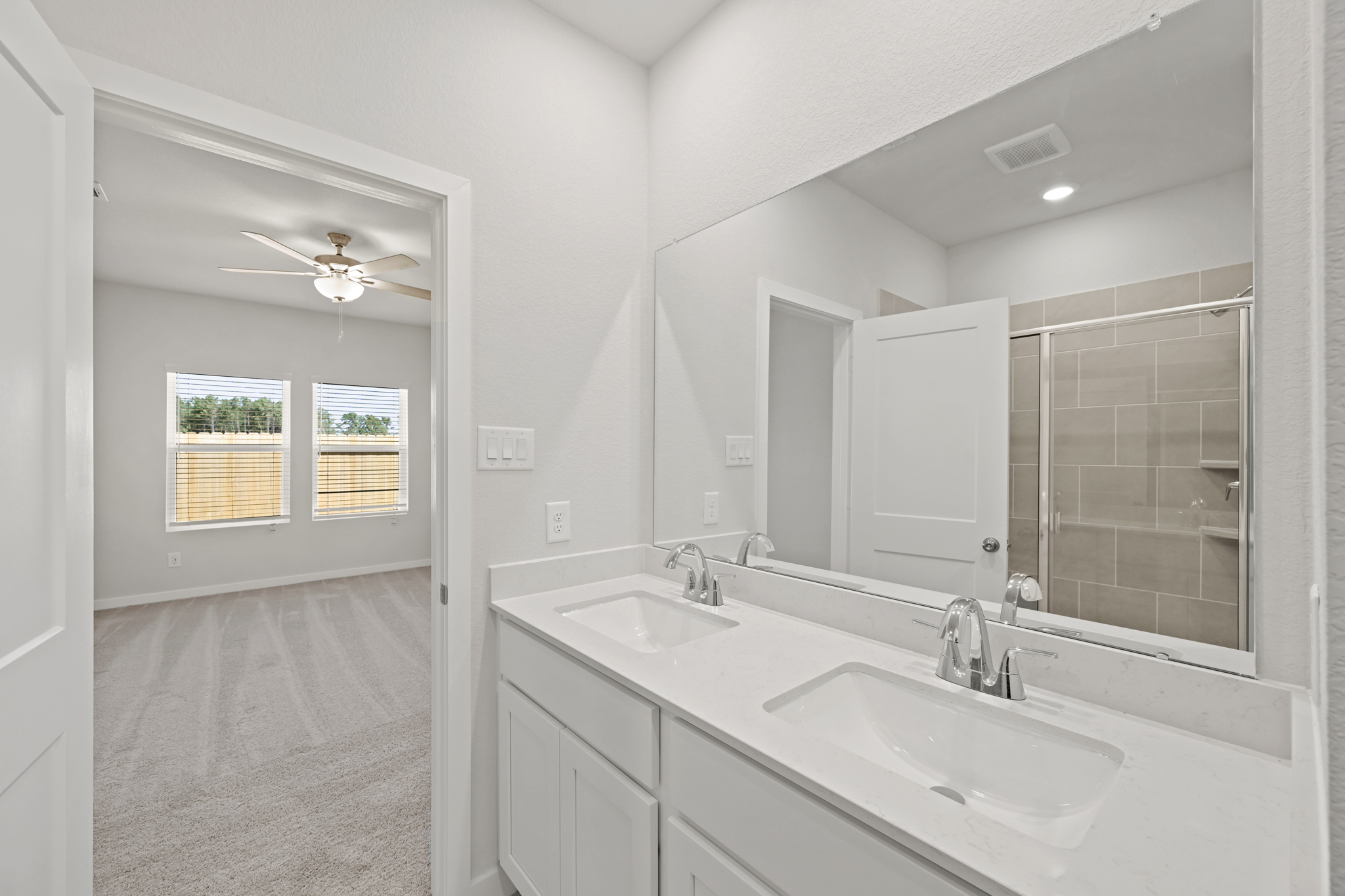 A bathroom with two sinks.