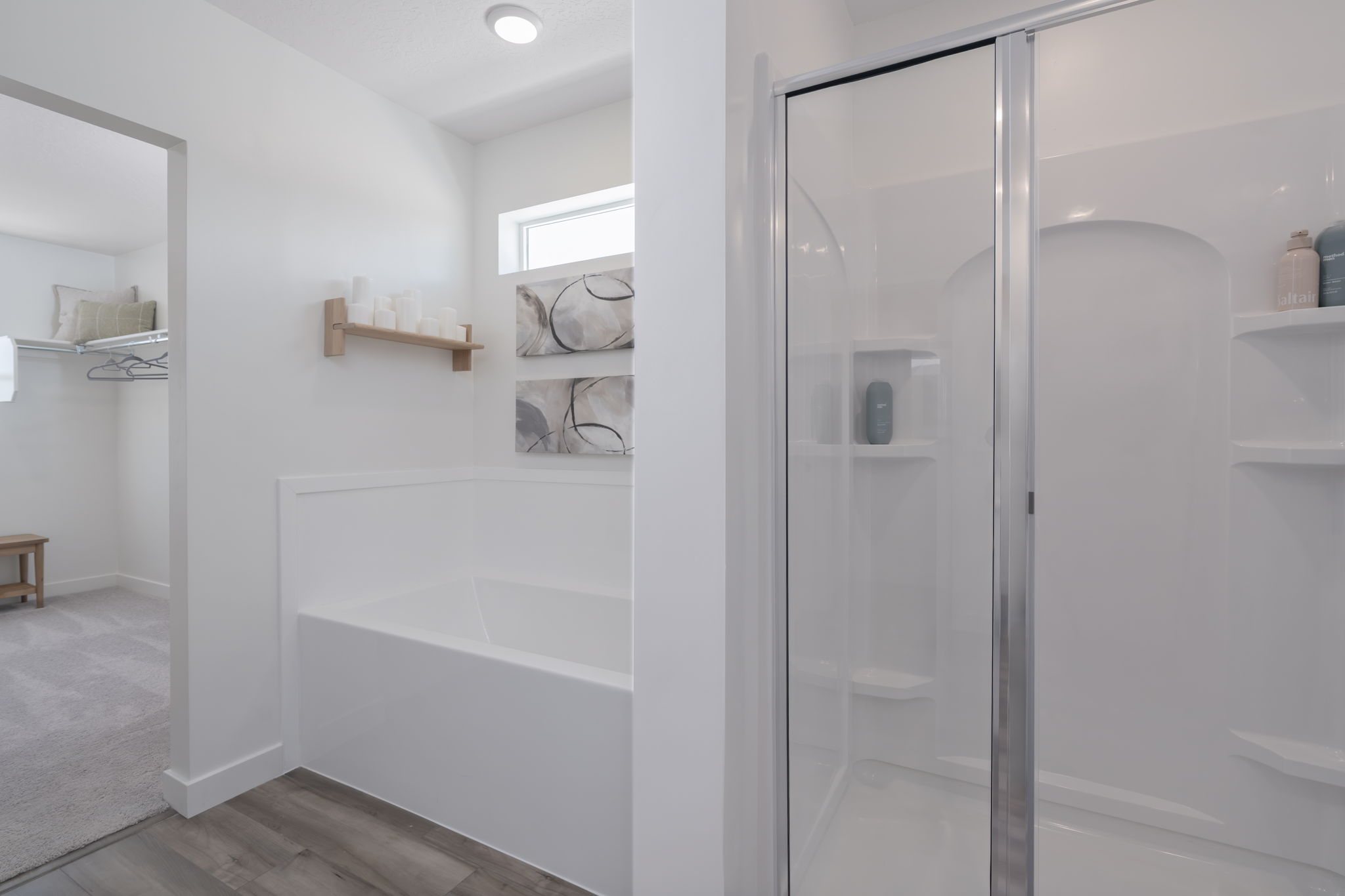 A bathroom with a glass shower.