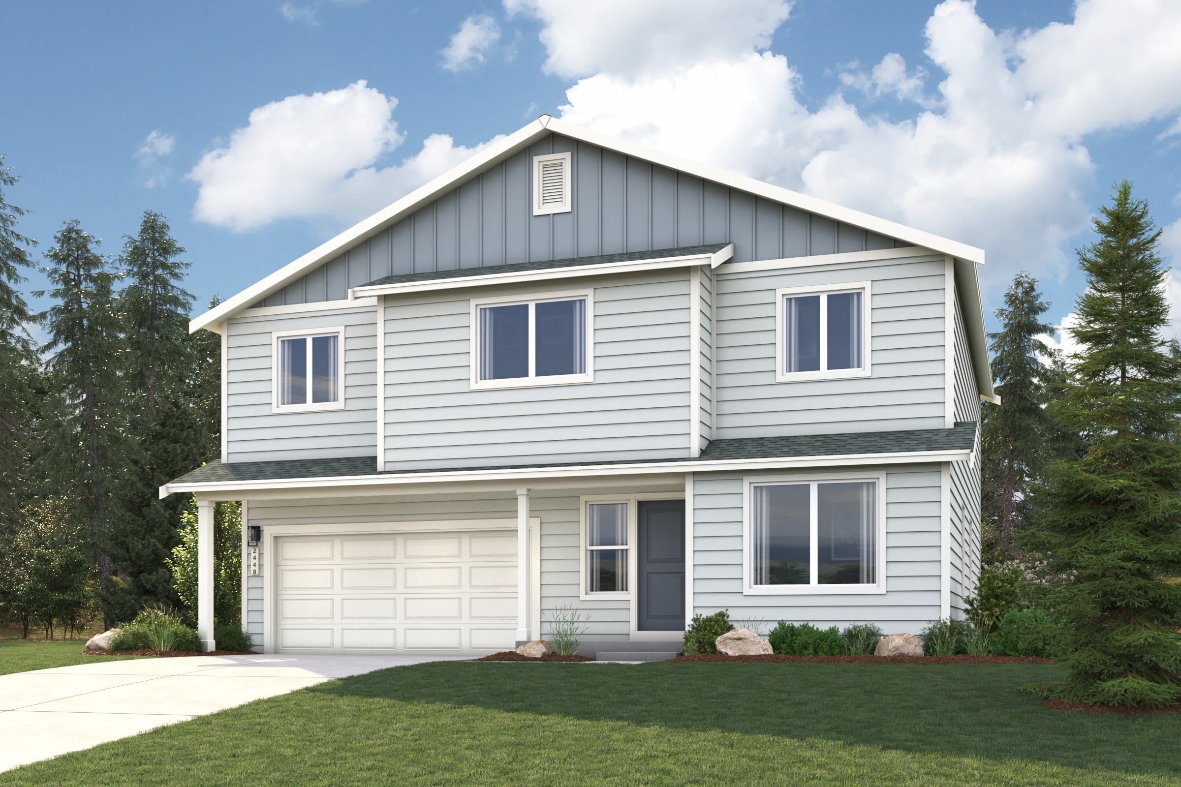 A white house with a driveway.