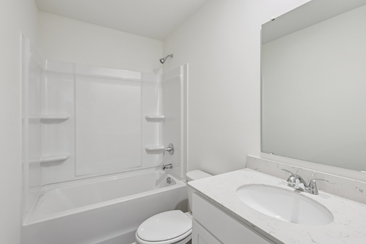 A bathroom with a sink and a bathtub.