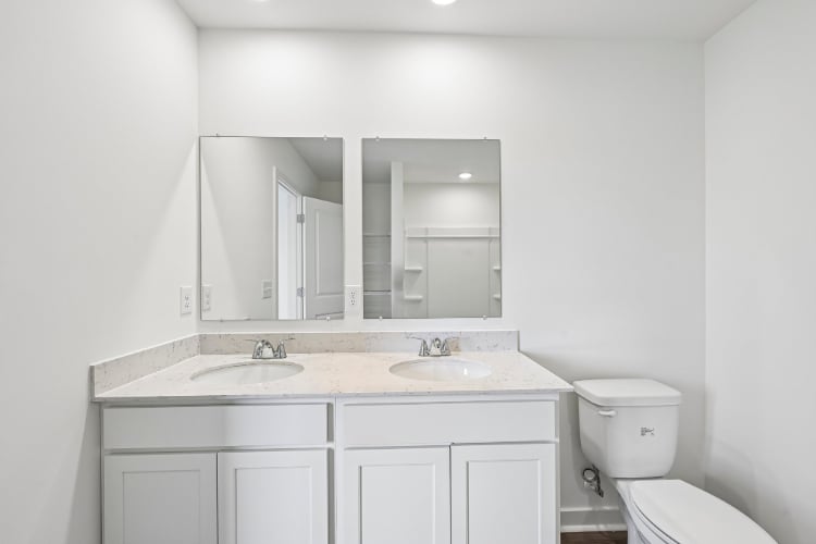 A bathroom with a sink and a toilet.