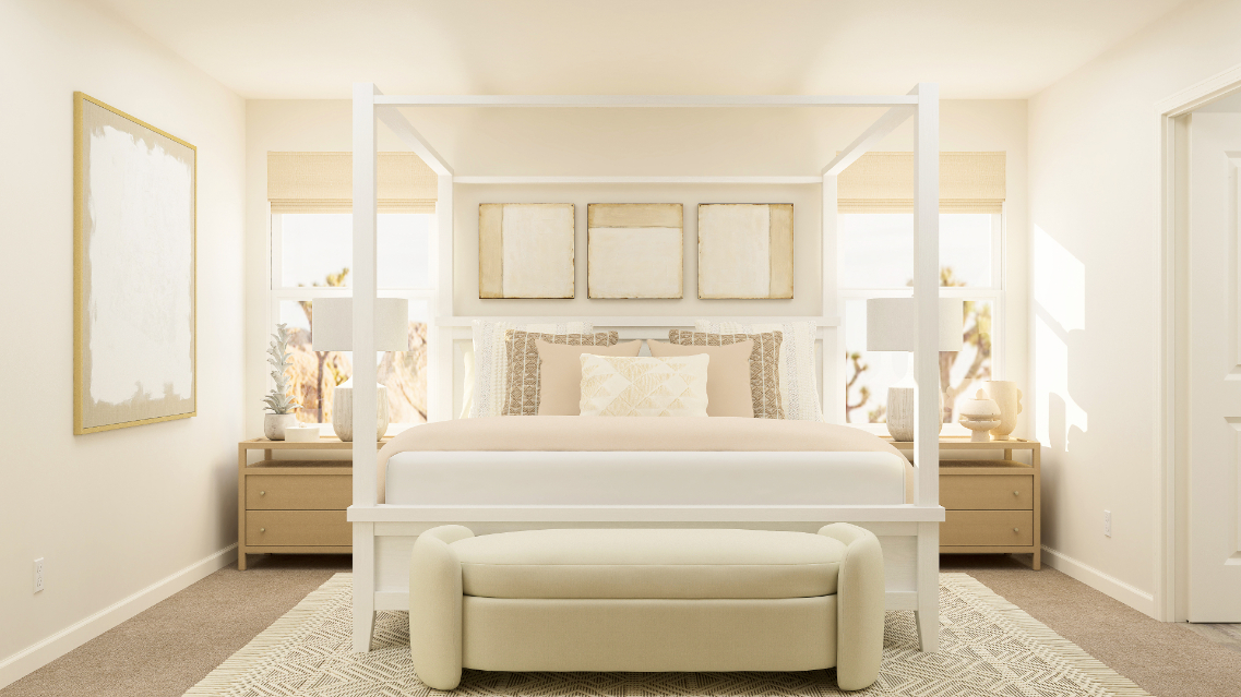 A white bed in a room.