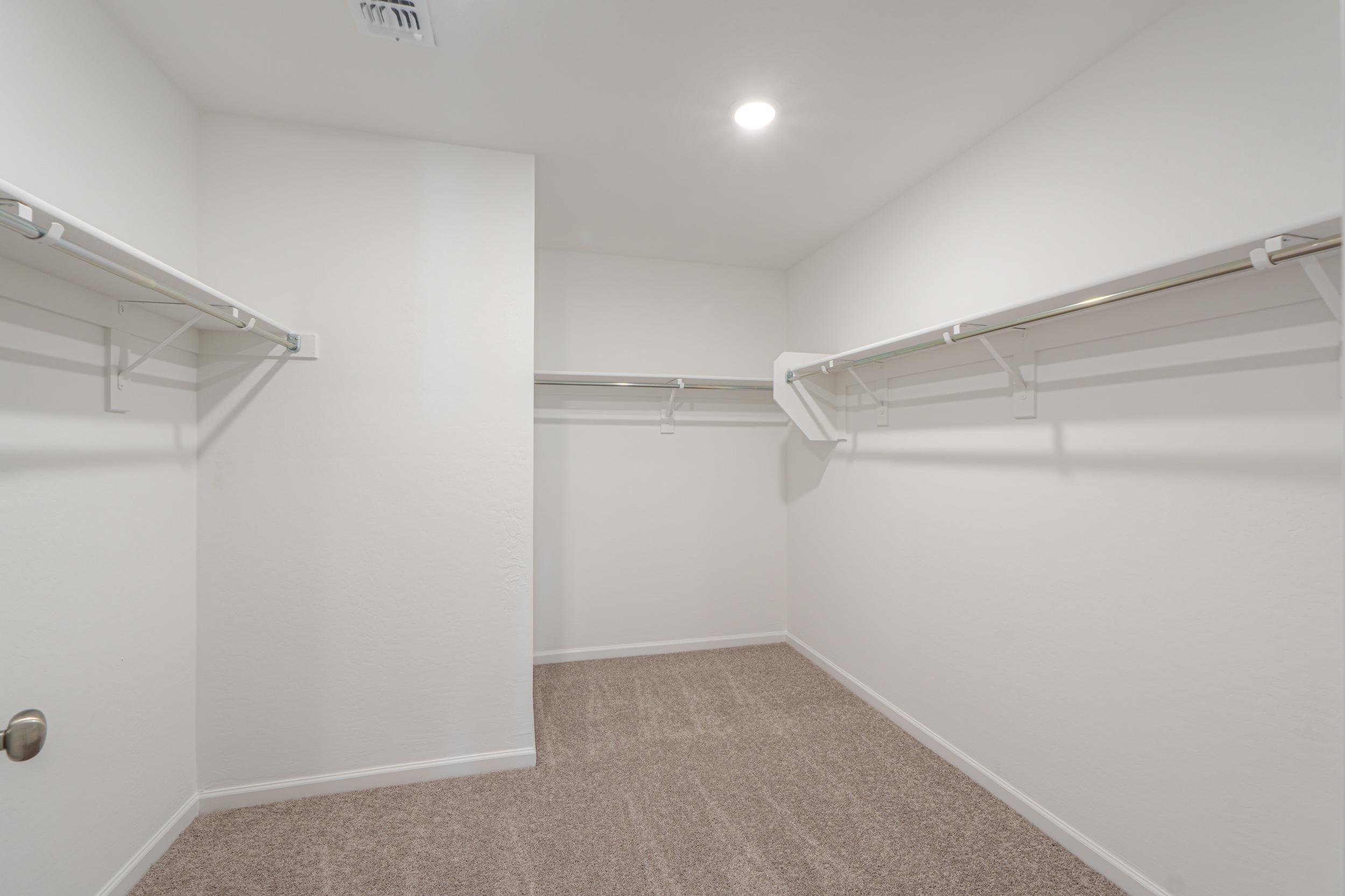 A hallway with white walls.