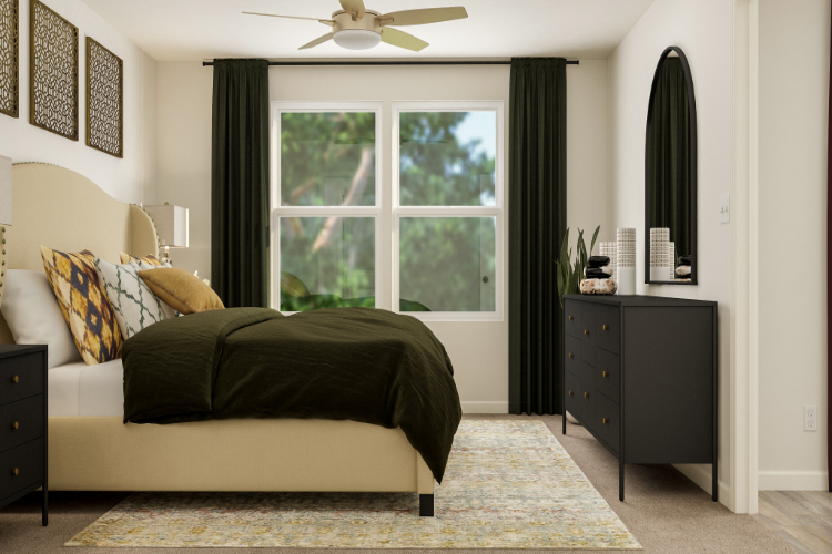 A bedroom with a bed and a window.