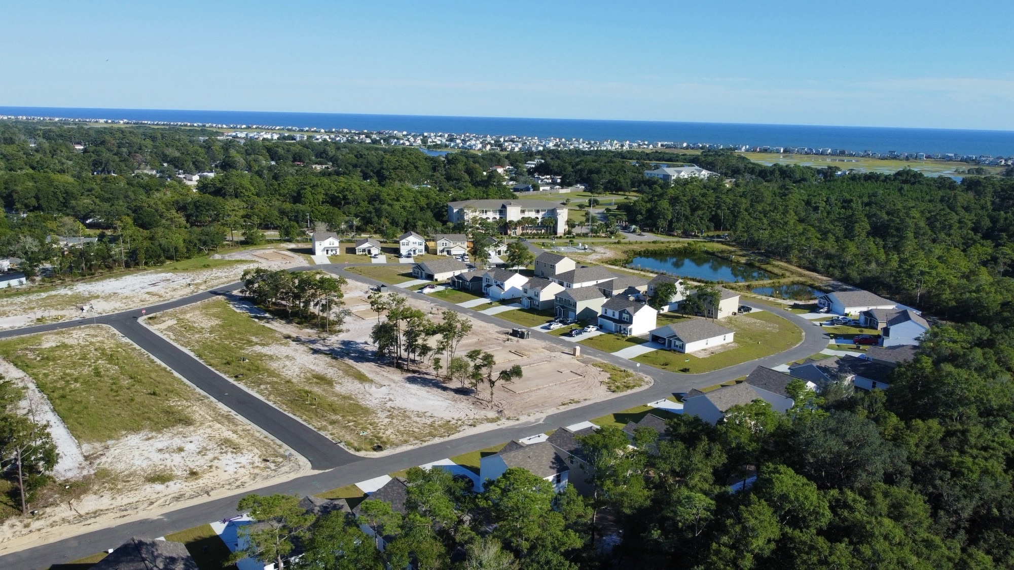 A landscape with houses and trees.