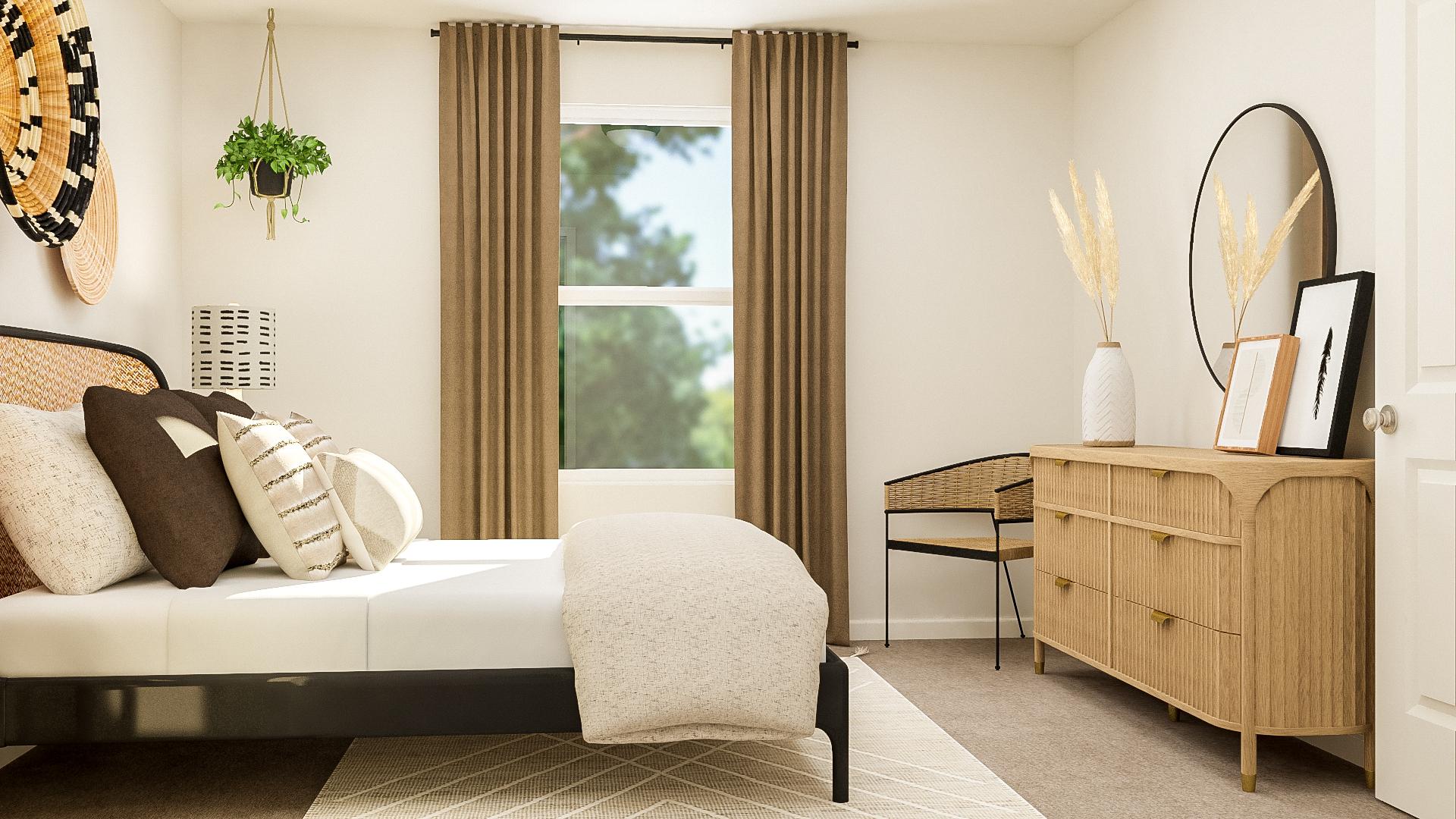 A living room with a white couch and a white table.